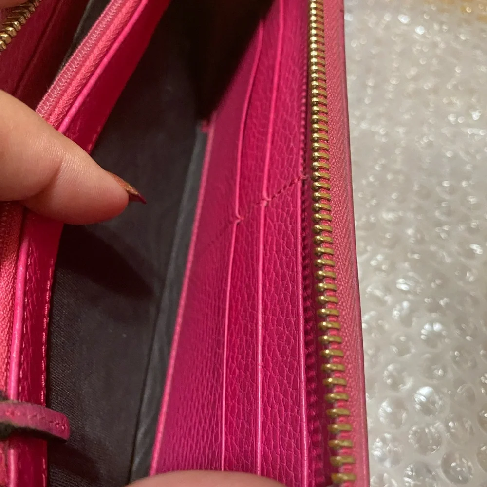 Gucci GG Marmont zip-around wallet in shocking pink